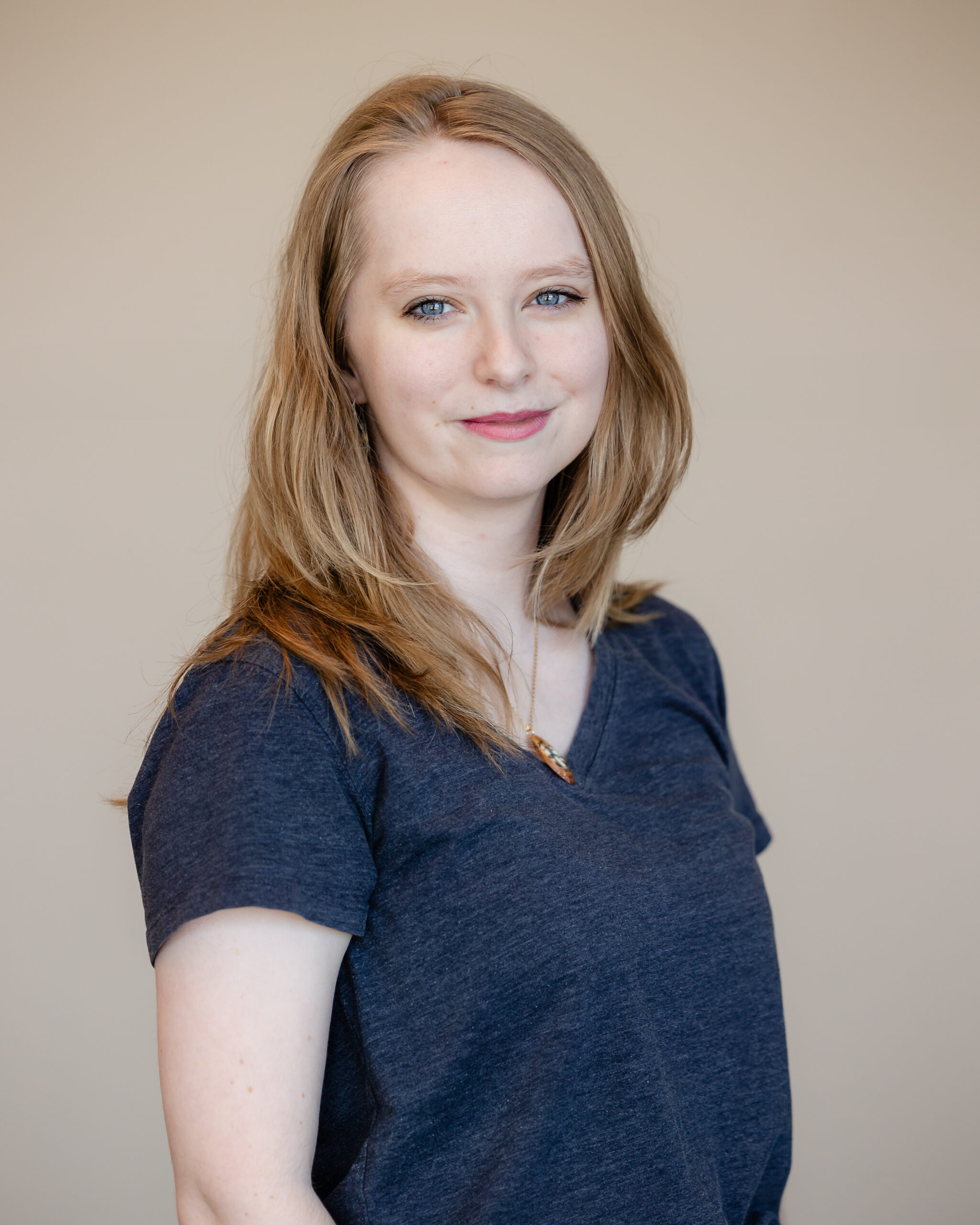 Ashley Coltellino, Zebra Club member and mEDS patient advocate, smiling headshot